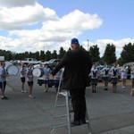 Dean Antczak directing the band from a ladder